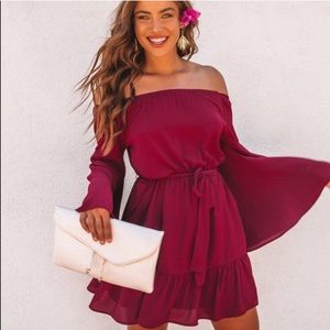 Simplicity pocketed off the shoulder dress